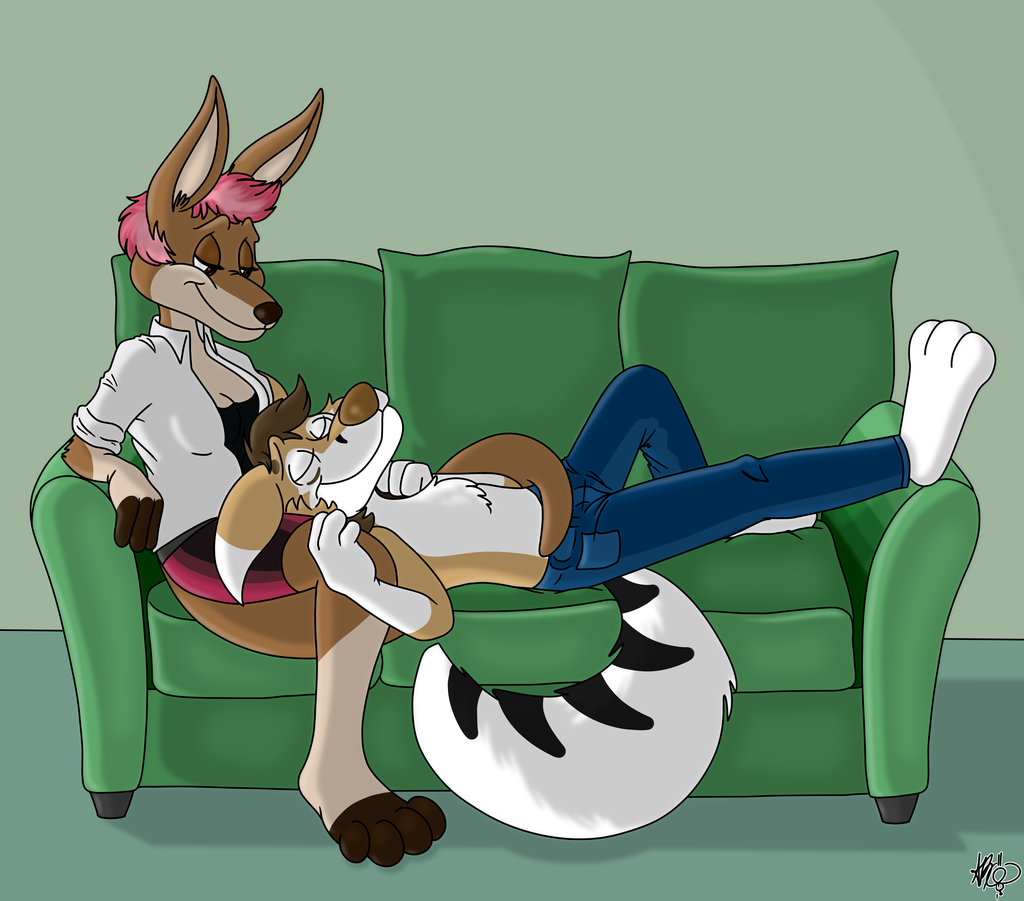 A comfy lap on a comfy couch, shaded