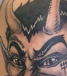 Devilish Arm Tattoo