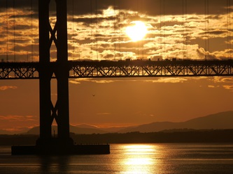 The Forth Road Bridge with the sun